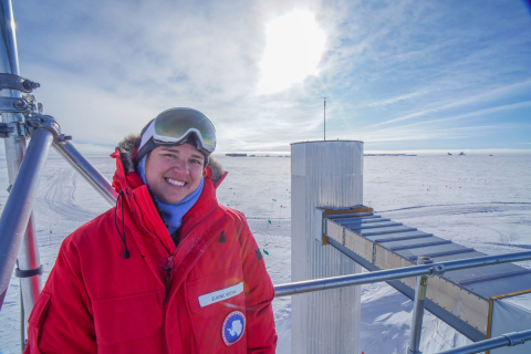 Elaine standing on top of a building at the South Pole