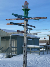Sign post with signs to various places