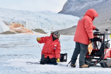 Scientists gather samples through the ice.
