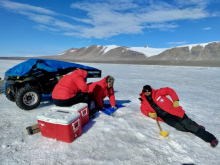 Scientists working on lake ice.