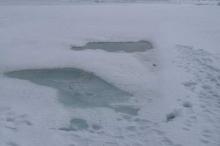 Melt Pond on An Ice Floe