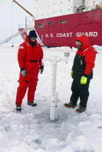 Paul Aguilar and Mark Stephens with ice mass balance buoy