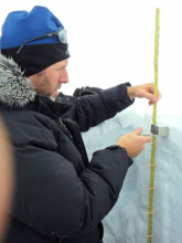 Measuring snow density in AWS Summit snow pit