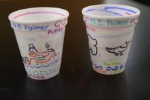 Decorated cups to be lowered to the bottom of the ocean