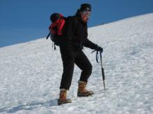 Lesley Urasky navigating the snow/ice field on the side of Mt. Hope.