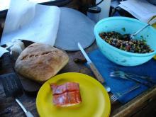 Dinner!A serving of salmon, the loaf of bread, and the salad. Better than most food we get in Barrow. 