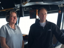 Dr. Carin Ashjian (left) with Captain Forest McMullen (right) on the bridge of the R/V Sikuliaq.  August 24, 2016.  Photo by Lisa Seff