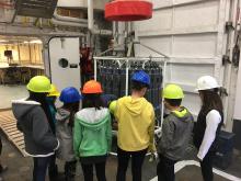 Anvil City Science Academy middle school students learn about the CTD with Dr. Okkonen and Dr. Stafford onboard the R/V Sikuliaq. Photo by Lisa Seff.  September 18, 2017.