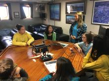 Anvil City School Science Academy school students learn about drones from Jennifer Johnson onboard the R/V Sikuliaq. Photo by Lisa Seff.  September 18, 2017.