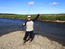 Mark catches his second Arctic Grayling fish.