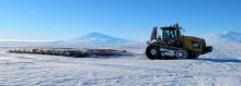 Vehicle pulling fuel in traverse to South Pole