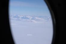 iceberg and transantarctic mountains
