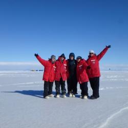 5 women on the sea ice in Antarctica