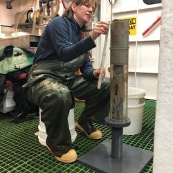 PolarTREC educator Sarah Slack helps to process a sediment sample