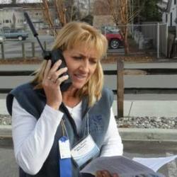 Anne Marie Wotkyns on satellite phone