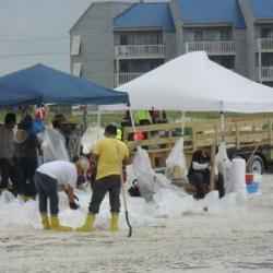 Clean up crews in Gulf Shores, Alabama