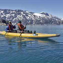 Joe Super and Bill Schmoker sea kayaking in Skoldungensund, Greenland