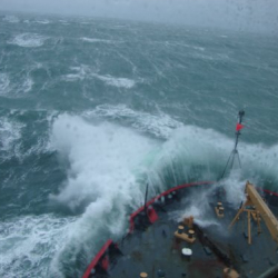 USCG Cutter Healy breaking through the Bering Sea waves