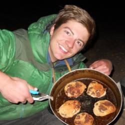 Sam Blair shows off his camp cooking skills.